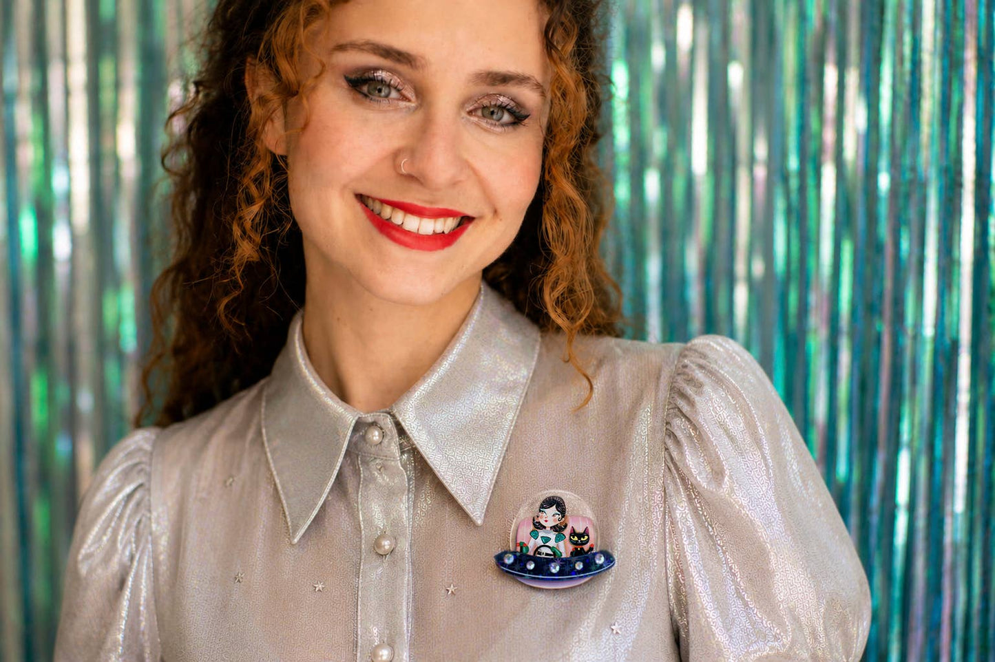 UFO brooch with girl and space