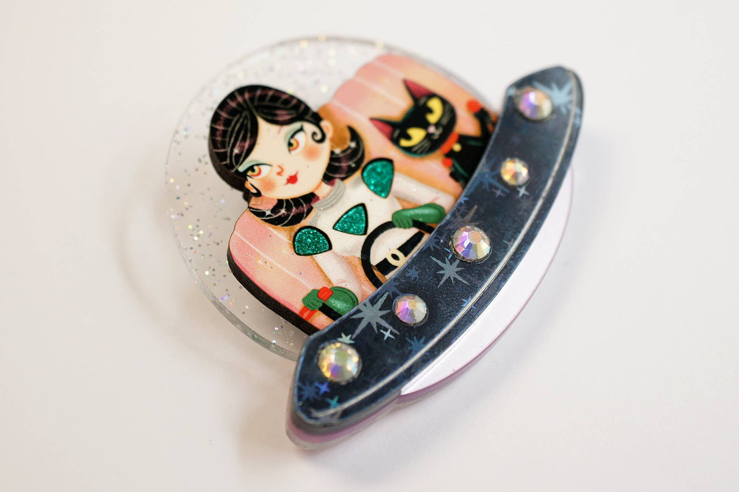 UFO brooch with girl and space